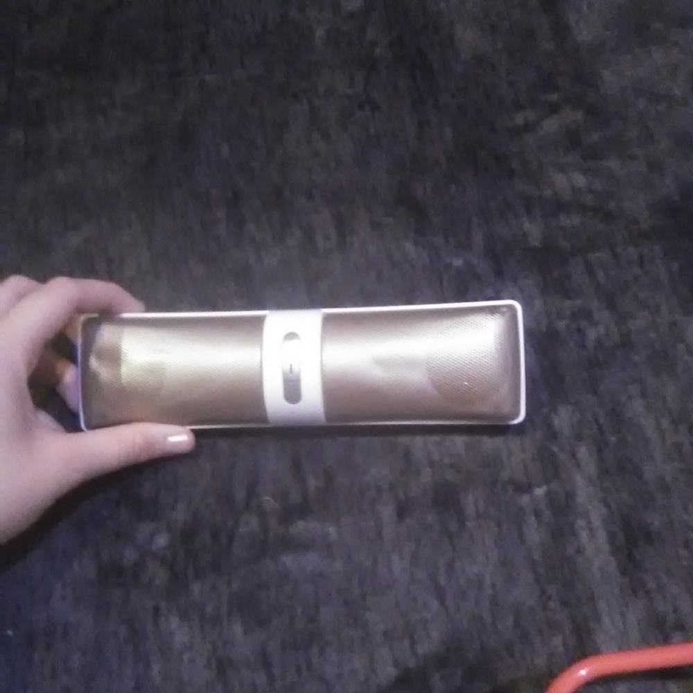 Gold and white speaker